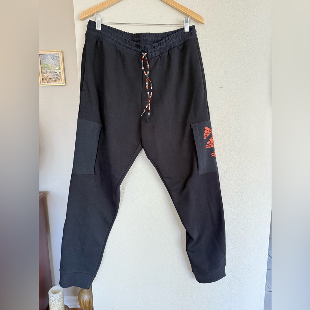 Adidas Men's Black Joggers with orange-red Logo